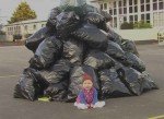 Child on garbage wallpaper